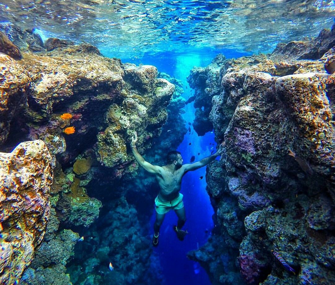 Underwater view of the Blue Hole with diver