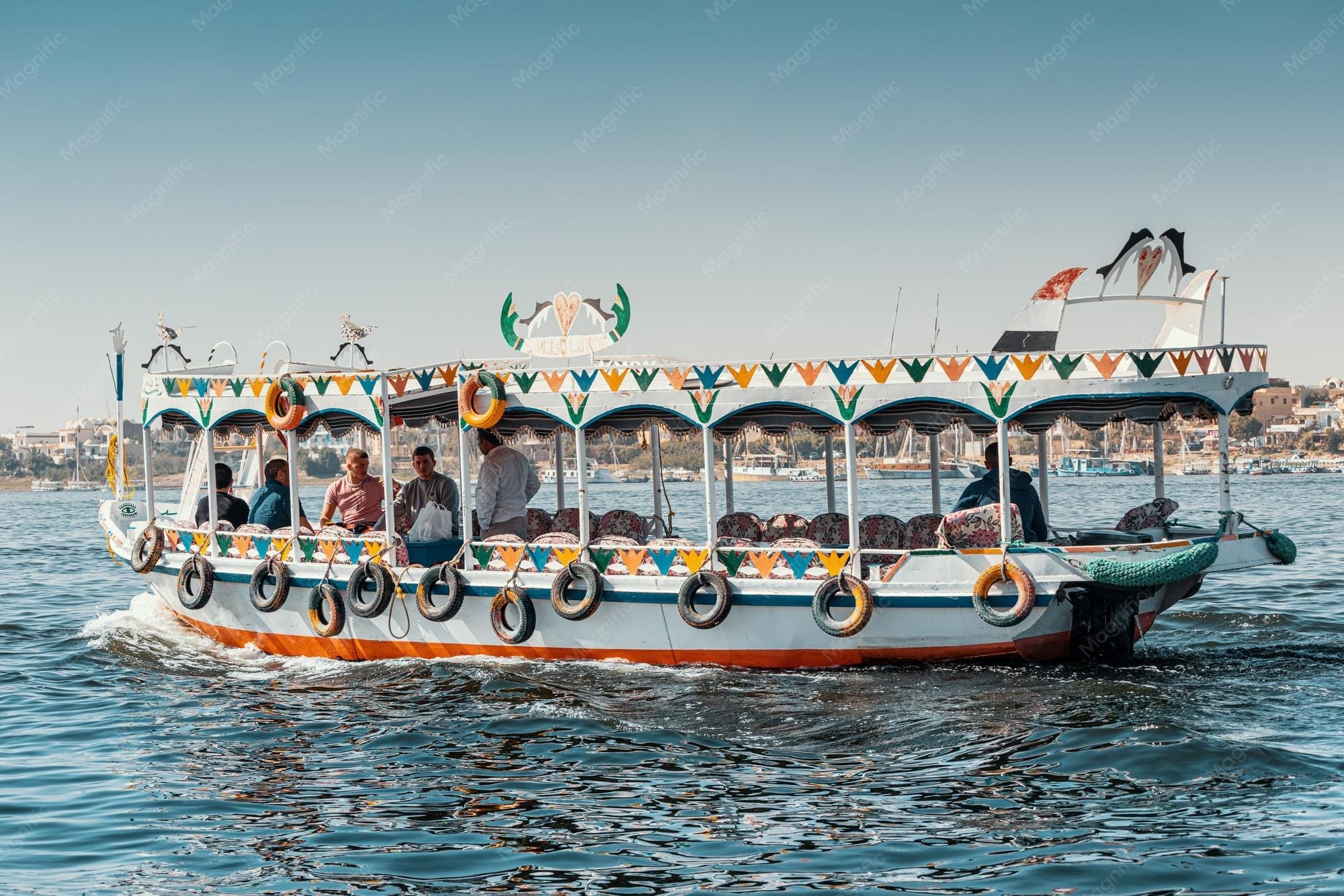 Ferry crossing the sea with coastal views
