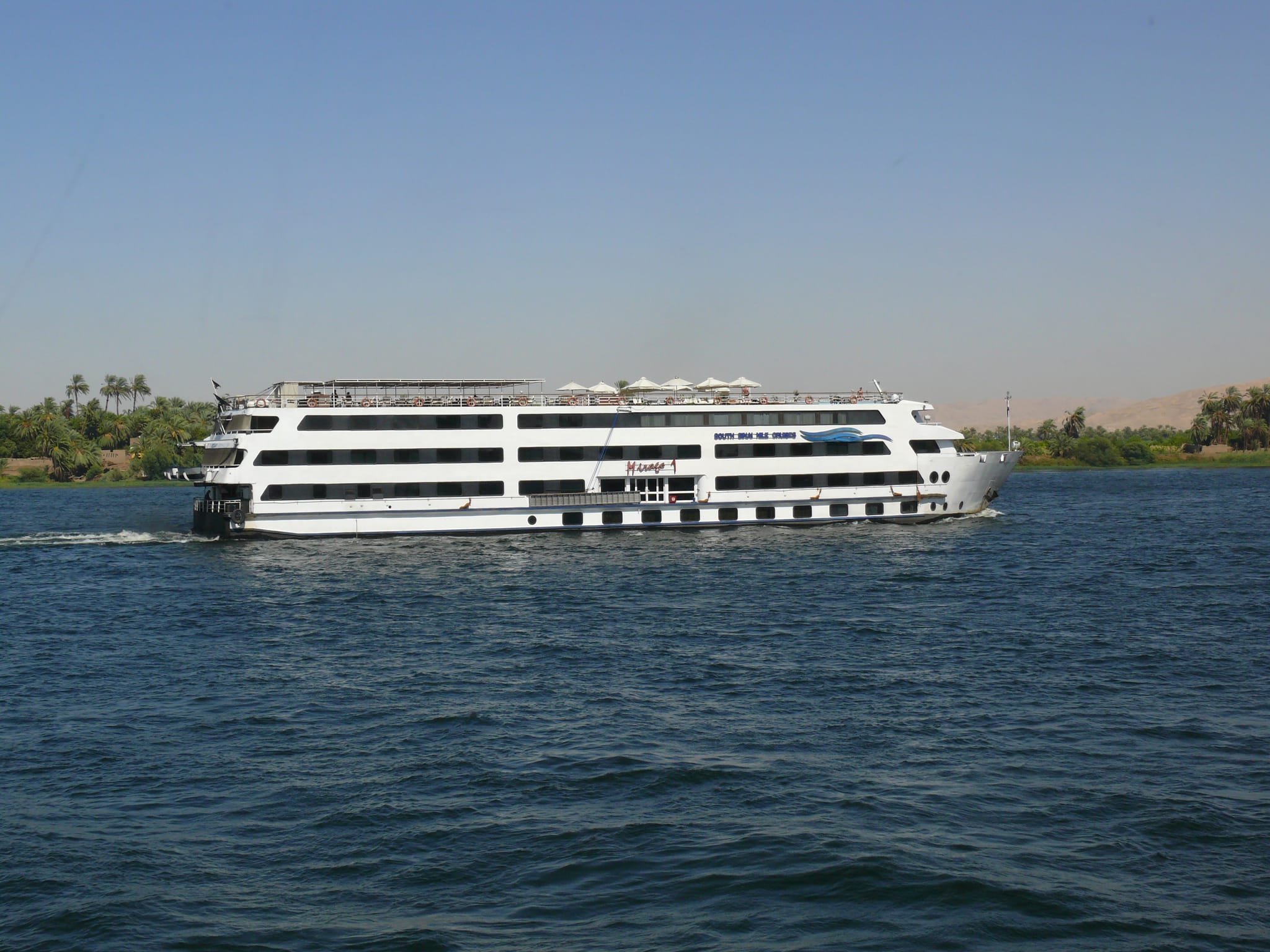 Luxury Nile cruise ship sun deck on the river at sunset Egypt