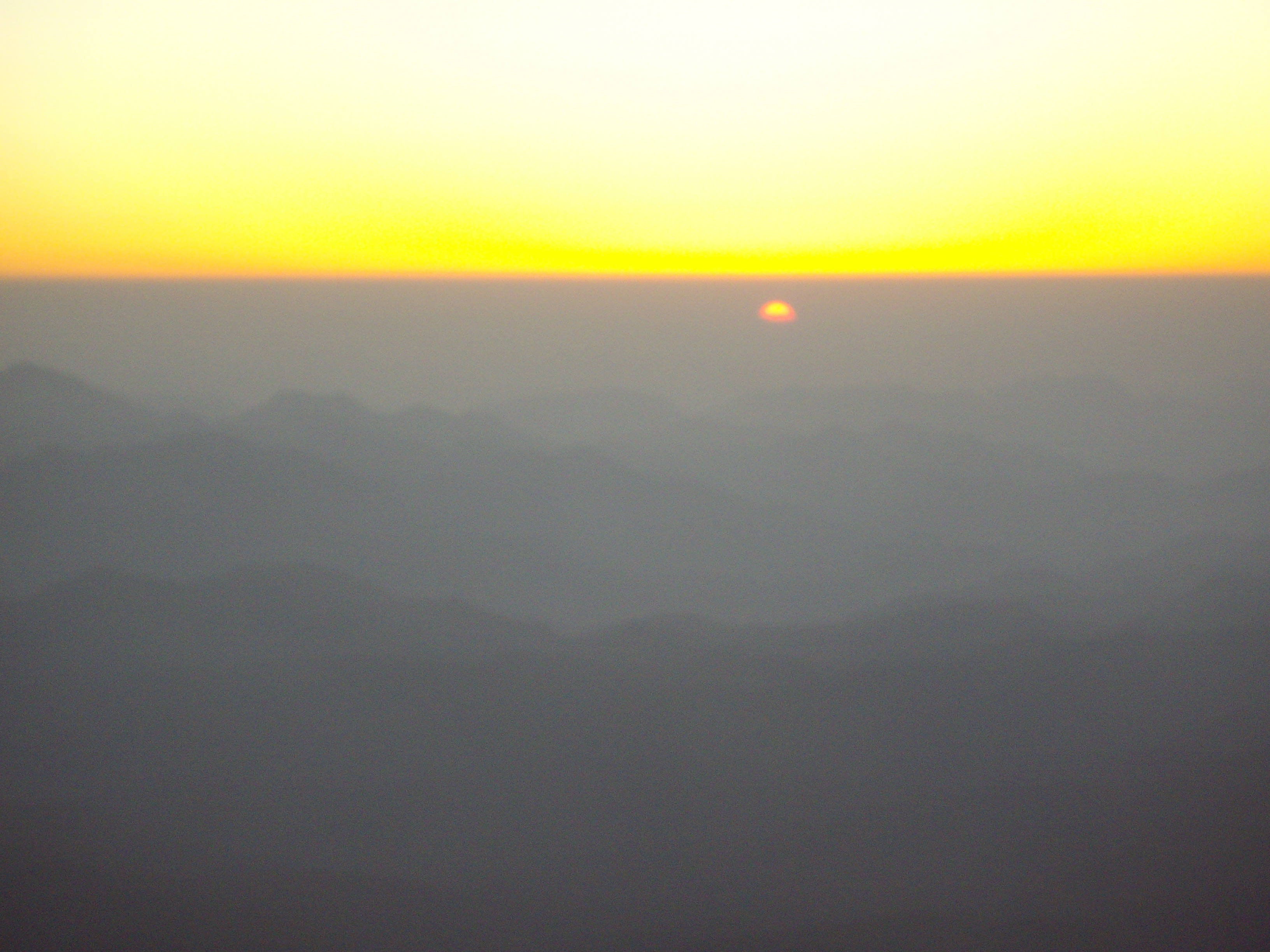 Sunrise over Mount Sinai with a glowing sky