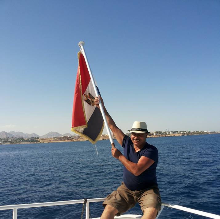 Snorkeler enjoying the clear turquoise waters and vibrant coral reef in Sharm El Sheikh